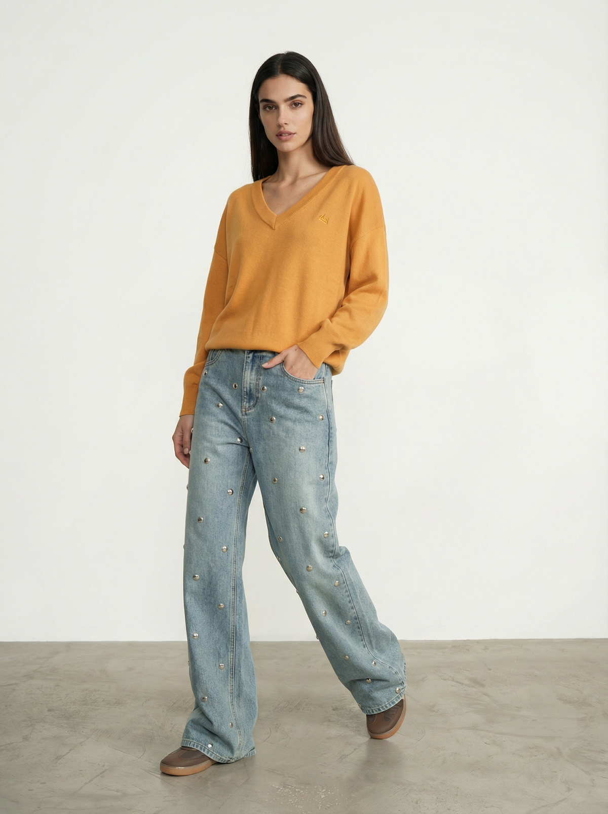 JEANS CON BORCHIE ALL-OVER
