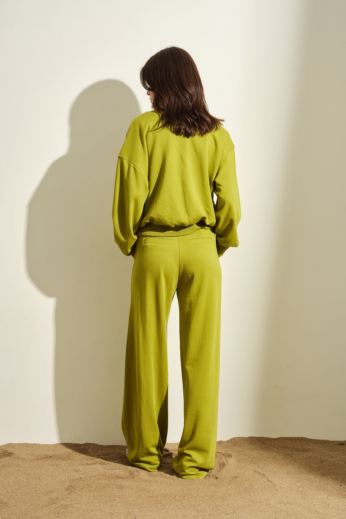 PANTALONE CON ANELLI DI STRASS